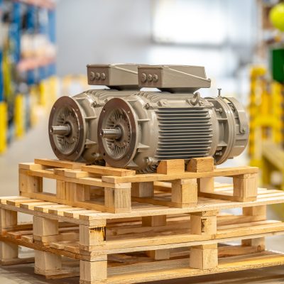 new modern electric motors ready for export in the factory on pallets.