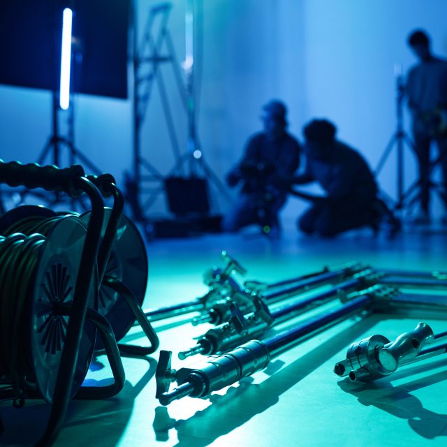 Close-up of professional equipment for shooting lying on the floor in studio
